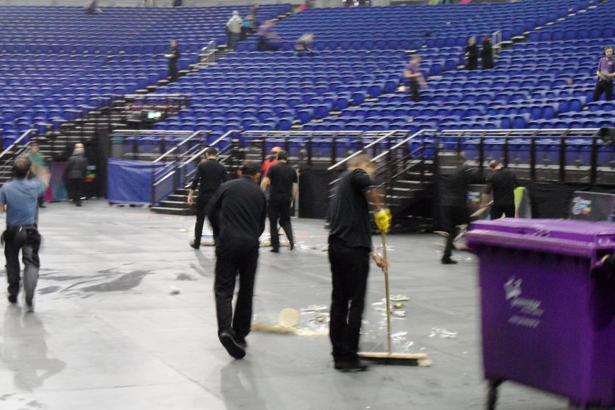 Cleaning up the standing area.